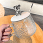 Vaso de vidrio con cuchara decorado con oso