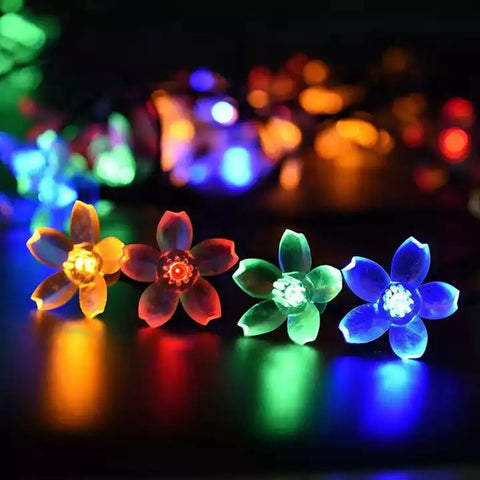 Luz solar guirnalda flores